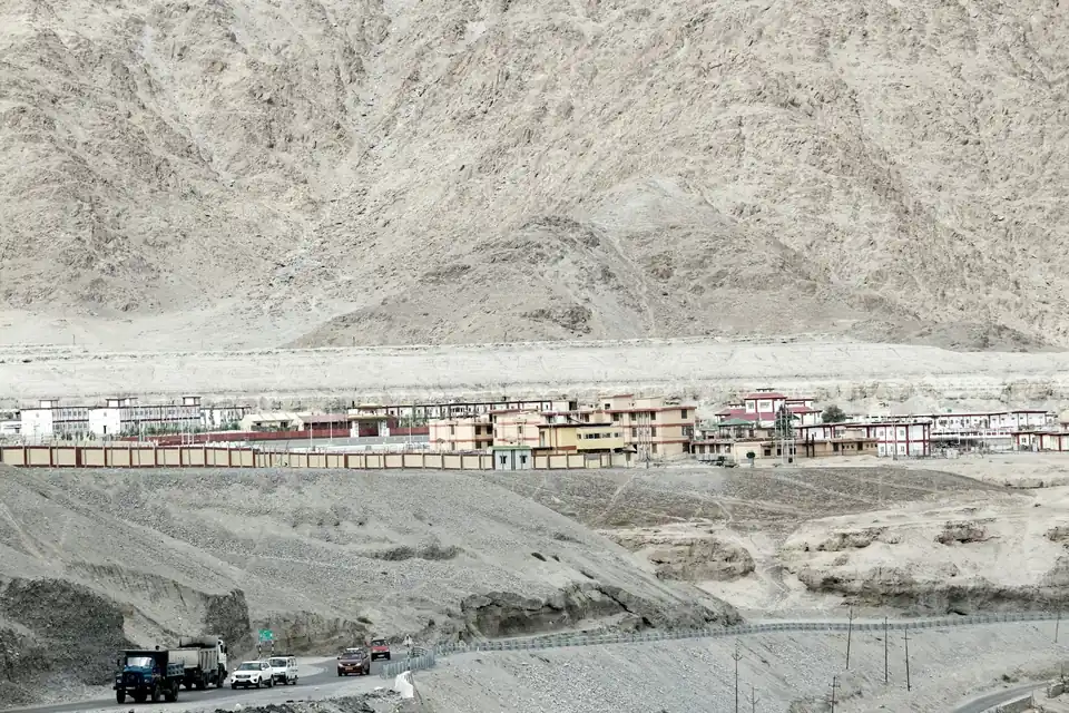 Open high-altitude landscape surrounded by mountains in Ladakh