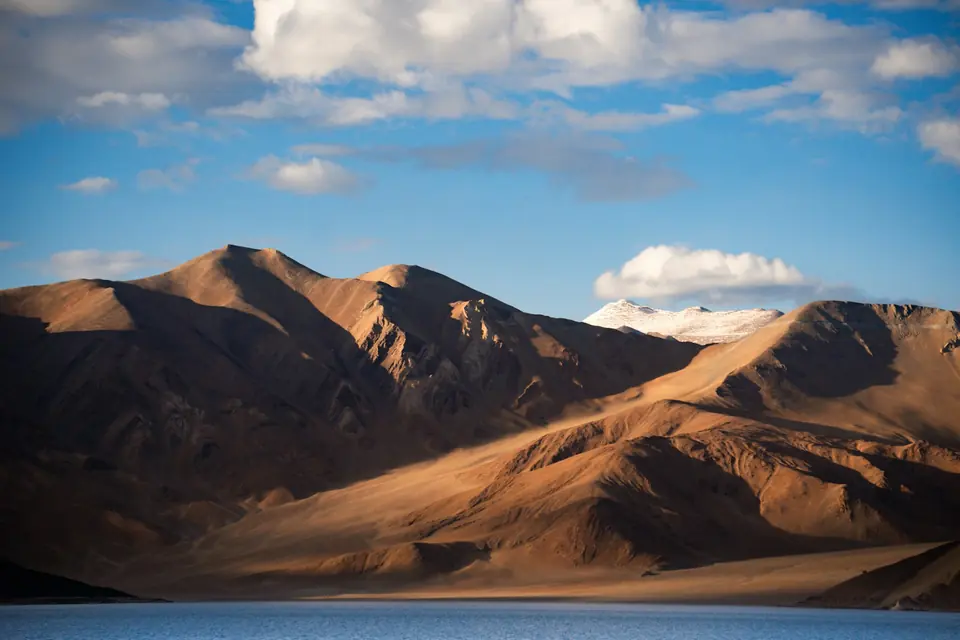 Blue water and high mountain scenery at Pangong Lake in Ladakh